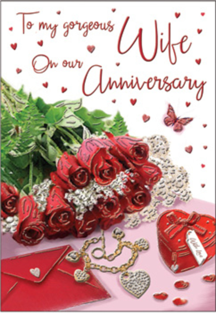 This richly detailed anniversary card scene presents a romantic tableau that could easily accompany a fresh bouquet delivered to a home in Stepney, just off the bustle of Mile End Road. At its centre, a bouquet of classic red roses commands attention, each bloom perfectly formed, petals layered in full, luxurious curves that evoke both passion and reassurance. The roses are gathered as if elegantly wrapped, paired with lush green foliage that peeks through and frames the intense red tones, adding a sense of natural abundance. Nearby rests a vivid red box, shaped like a small gift and hinting at a treasured piece of jewellery inside. Beside it, a jewellery set glimmers - delicate metal catching the soft light, perhaps a necklace and matching earrings set out in anticipation of an anniversary evening. Whisper-fine lace details and tiny heart motifs are woven through the design, adding gentle texture and a sense of handcrafted care, like the finishing touches a local florist might add before sending an arrangement out across Stepney and Limehouse. The background is warm and inviting, washed in creamy tones that allow the reds and golds to glow without distractions. Subtle reflections on the surface suggest satin or silk, adding to the impression of luxury and intimacy. Scripted words, though not fully legible, sweep gracefully across part of the card, their calligraphy echoing the curves of rose petals and jewellery chains. The entire composition radiates romance - from the interplay of velvet, lace, and polished metal to the soft, embracing light - creating an image that feels like a visual hug, perfectly suited to honouring an anniversary steeped in shared history and heartfelt emotion.